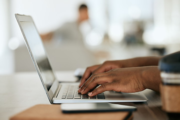 Image showing Hands typing, working and computer planning of a black woman in a coffee shop with digital work. Web development, woman and tech programmer coding a website design doing remote work in a restaurant