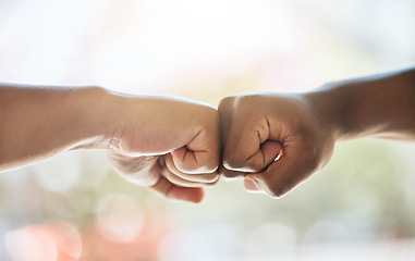 Image showing Fist bump, race solidarity and hands of team together for team building support, diversity and partnership collaboration. Bokeh background, racism and friendship greeting for teamwork welcome