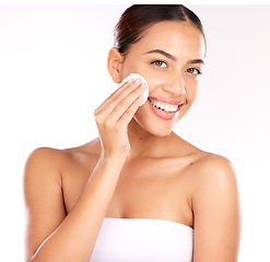 Image showing Beauty, portrait and woman in studio with cotton pad for skincare, cleaning and makeup removal on white background. Face, facial and swab with girl model for skin, product and cleanser with mockup