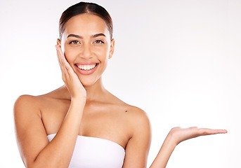 Image showing Beauty skincare and portrait of woman with product mockup for facial, luxury or spa wellness. Smile, makeup and health with face of girl model and hands presentation for cosmetics, self care and glow