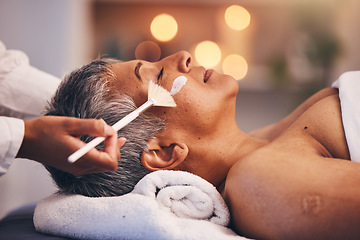 Image showing Spa, facial and senior black woman with mask for skincare, beauty and luxury treatment at beauty salon. Wellness, face massage and mature female relax on holiday, vacation and retirement at resort