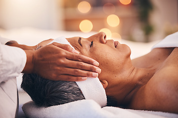 Image showing Wellness, health and massage, senior woman at a spa getting luxury beauty therapy and facial. Mature black woman, zen and masseuse massaging oil on head to help relax body and mind for stress relief.