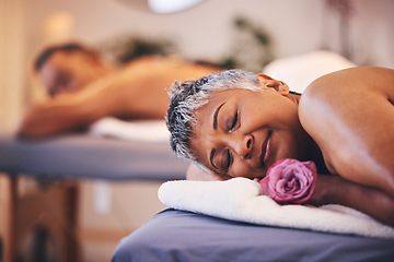 Image showing Relax, couple and massage at a spa for senior people on a table for wellness, zen and skincare treatment. Peace, luxury and senior woman happy with flower, aromatherapy and relaxation in Thailand