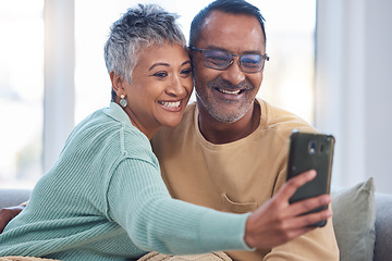 Image showing Senior couple and phone selfie for wellness on pension together at happy home in Mexico. Love, marriage and retirement people relax on sofa with happy smartphone photograph for bonding.