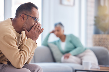 Image showing Thinking, divorce and old couple with financial stress, money problems or fighting about mortgage bills at home. Divorce, depression or frustrated old man with a senior partner after argument on sofa