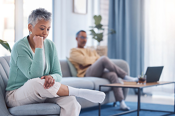 Image showing Divorce, thinking and sad old couple in counseling after a fighting about money, debt or financial problems at home. Stressed, mental health and angry senior woman in therapy with marriage partner