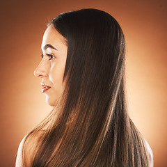 Image showing Hair care, woman and in the morning for skincare, natural beauty and cosmetics on brown studio background to relax. Young female, healthy girl or thinking with clean hair style, hygiene or confident