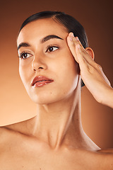 Image showing Woman, skincare and face in beauty cosmetics, makeup or facial treatment against a studio background. Beautiful female model posing in relax touching skin in cosmetic or perfect care on mockup