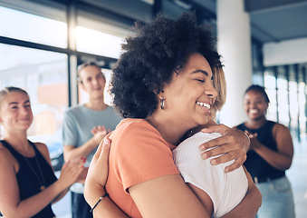 Image showing Women, hug and support of friends with group applause for counseling, therapy and trust for psychology and stress management. Group of people together for mental health, healing and help at workshop