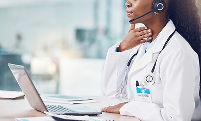 Image showing Healthcare, video call and a doctor consulting online. Communication, technology and innovation, a black woman or medical worker using laptop and internet to consult from hospital office