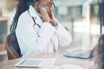 Image showing Doctor, explaining and online consultation using laptop for a virtual checkup for throat or covid while sitting in hospital office. Female medical insurance assistant on video call for telemedicine