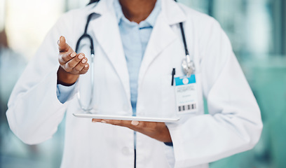 Image showing Medical, woman and health doctor with tablet, consulting and doing online research in a hospital. Healthcare, female and surgeon using technology as modern healthy resource and discussing results.