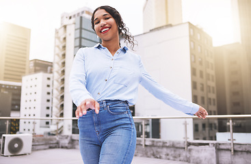 Image showing Freedom, stye and happy woman in an urban city, having fun outdoors on the weekend alone. Portrait of a young female looking fashionable and feeling confident while spending her free time downtown