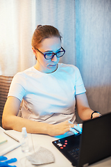 Image showing Woman in office working with laptop