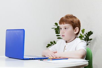 Image showing boy studying, a close-up