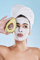 Image showing Beauty, skincare and avocado face mask with a beautiful woman taking care of her clean and healthy skin. Organic, fresh and cleansing facial with routine spa treatment with natural ingredients