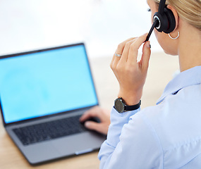 Image showing Call center, contact us and laptop of a woman employee or agent using her computer with headset in the office. Female worker in customer support or telemarketing at her desk ready for consulting.