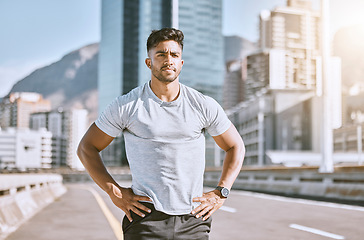 Image showing Serious sports man ready for fitness, workout and healthy exercise in urban city. Strong runner, thinking guy and determined athlete with motivation training for cardio run, marathon or jog outdoors