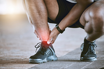 Image showing Sports, injury and fitness ankle pain during exercise, running and training outside with red color on foot, muscle or joint. Man, risk and hurt hands athlete holding broken leg bone with bad bruise