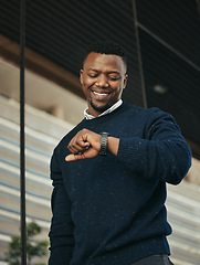 Image showing Time, watch or deadline with a businessman looking at his wristwatch to check the hour for travel, an appointment or a schedule. Corporate employee at the airport for international or global business