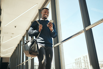 Image showing Travel business man getting email or social media notification while walking to work at corporate company. Happy professional reading a marketing discount newsletter for airport business class flight