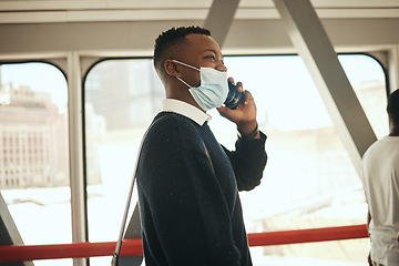 Image showing Covid, face mask and working man on call while travelling to office. Pandemic regulations and safety while commuting in the city. Business person communication on phone with remote colleagues.