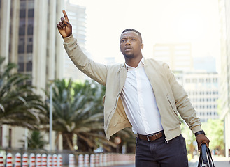 Image showing Travel, traffic and businessman try to stop taxi or transport driver to go to work, business meeting or airport to catch a plane. Business man in urban city, on the road and catching cab or car ride