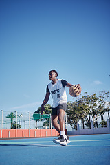 Image showing Sports, basketball court, and healthy man or player with motivation, vision or wellness goal for training, workout or exercise. Fitness of black man or professional competition athlete for ball game