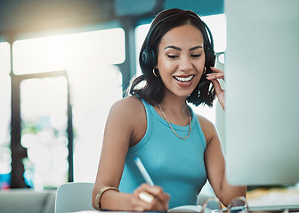 Image showing Call center agent, customer service and freelance sales entrepreneur with headset being friendly on video call while working from home. Smiling operator and happy consultant doing remote virtual work