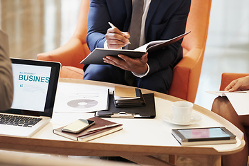 Image showing Laptop, business people and hands writing in a meeting planning advertising, marketing or sales strategy. Teamwork, management and corporate employees coworking on revenue data analysis or logistics