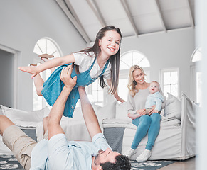 Image showing Happy, airplane and family playing in the living room together while bonding in their modern home. Happy, smile and parents relaxing with their children with love, care and happiness in a house.