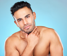 Image showing Beauty, skincare and grooming with portrait of man for facial, wellness and luxury. Product, cosmetics and cleaning with face of model for glow, beard routine and self care in blue background studio