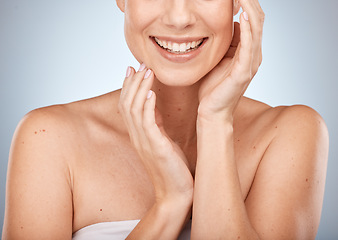 Image showing Happy woman, skincare and beauty cosmetics for shine, wellness and healthy glow on studio background. Closeup of model touching face after facial, laser results and chemical peel for clean aesthetics