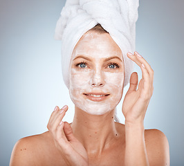 Image showing Beauty, skincare and facial with mask on woman face for spa, shower and luxury with self care. Cosmetics, dermatology and cleaning with portrait of model with towel for health, moisturize or cleanse