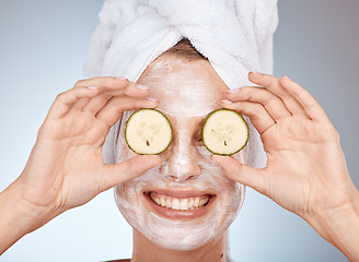 Image showing Skincare, facial mask and cucumber for woman, beauty cosmetics and wellness after fresh shower, bathroom morning routine and funny body care. Happy female, clean face and luxury aesthetic dermatology