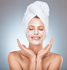 Image showing Woman, beauty and smile for skincare face mask, cosmetics or cream against a grey studio background. Female model smiling with teeth for facial cleanse, detox or clean cosmetic skin hygiene on mockup