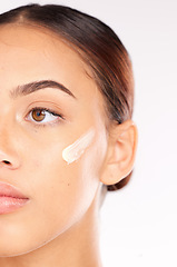 Image showing Skincare cream, half face and woman with beauty wellness, spa cosmetics and thinking against white studio background. Luxury product, facial moisturiser and model with sunscreen or dermatology lotion