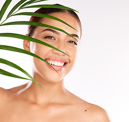 Image showing Leaf, skincare and natural cosmetic beauty of a woman portrait happy about sustainability cosmetics. Makeup, organic and plant based skin wellness from eco, green and eco friendly dermatology