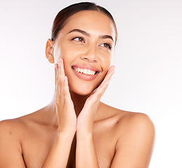 Image showing Woman, face glow and skincare grooming on white background in studio healthcare wellness, dermatology or acne treatment progress. Smile, happy or beauty model touching cheeks with hands in self love