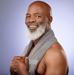 Image showing Shower, towel and portrait of black man with healthy skincare, personal hygiene and natural wellness on studio background in Brazil. Happy, mature and male beauty, clean face and body care cosmetics