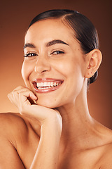 Image showing Portrait, beauty and woman in studio for makeup, skincare and glamour, pamper and wellness on orange background. Face, relax and girl model in Mexico smile for facial results, luxury and cosmetics