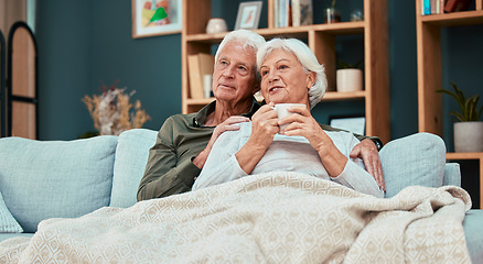 Image showing Relax, love and coffee with old couple on sofa with blanket for cuddling, affectionate or watching tv. Cozy, comfortable and retirement with man and woman in living room for break, marriage or lounge