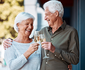 Image showing Senior couple, celebration and toast with champagne for anniversary, love and date outdoor with happy smile. Elderly man, woman and toast with alcohol drink, happiness and enjoy marriage relationship