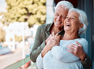 Image showing Senior man embracing his wife with love, happiness and care in the backyard of their home in Canada. Happy, smile and elderly couple hugging, laughing and bonding in outdoor garden at their house.