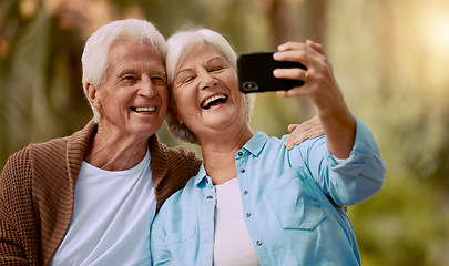 Image showing Senior couple and phone selfie and smile together outdoor during summer, social media and happy in park. Happy, Elderly man and woman take pictures on mobile smartphone for internet post or happiness