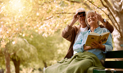 Image showing Retirement, relax and couple on bench at park in New York, USA for marriage leisure on pension. Love, care and happy elderly people bonding in nature together with blanket and cheerful smile.