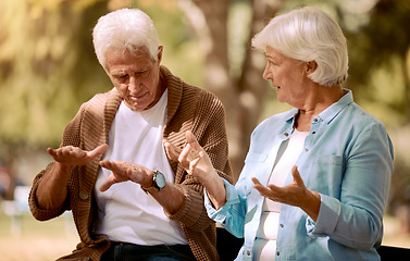 Image showing Senior couple, love and hands in sign language communication in nature, public park or garden. Retirement elderly, gesture or deaf disability in bonding date for man and woman in support conversation