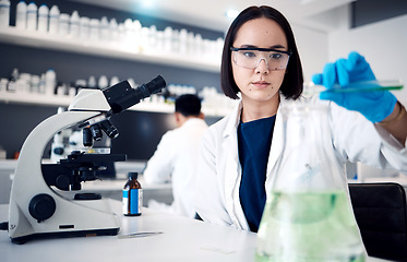 Image showing Lab, medical science and asian woman with beaker for chemistry experiment, research innovation and engineering scientist. Scientist, biology analysis and expert working with chemicals in laboratory