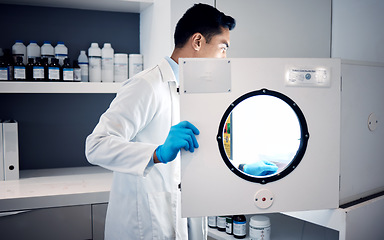 Image showing Man, scientist and laboratory autoclave equipment for medicine temperature control, medical research storage or chemical mixing. Healthcare worker, science and centrifuge machine for dna engineering