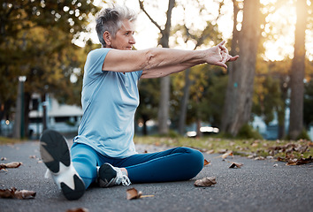 Image showing Fitness, stretching and senior woman in a park, training motivation and outdoor workout for energy. Nature exercise, cardio warm up and elderly runner with idea for body performance in retirement